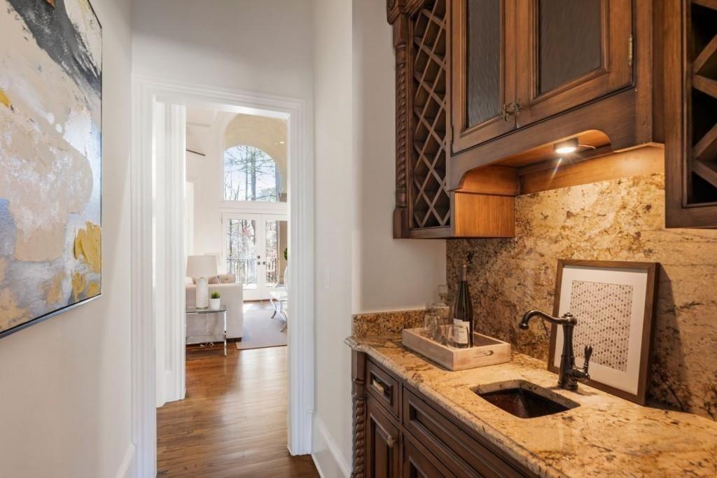 2250 Blackheath Trace Alpharetta, GA 30005 - Photo 24 of 51 a kitchen with a stove and a sink