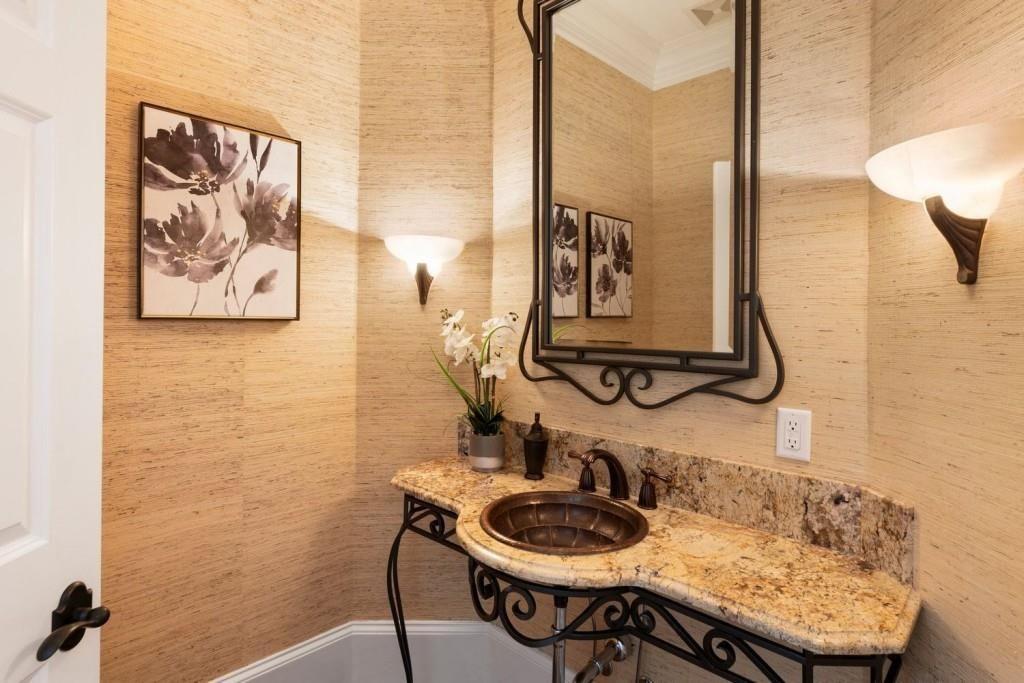 2250 Blackheath Trace Alpharetta, GA 30005 - Photo 25 of 51 a bathroom with a sink and a mirror