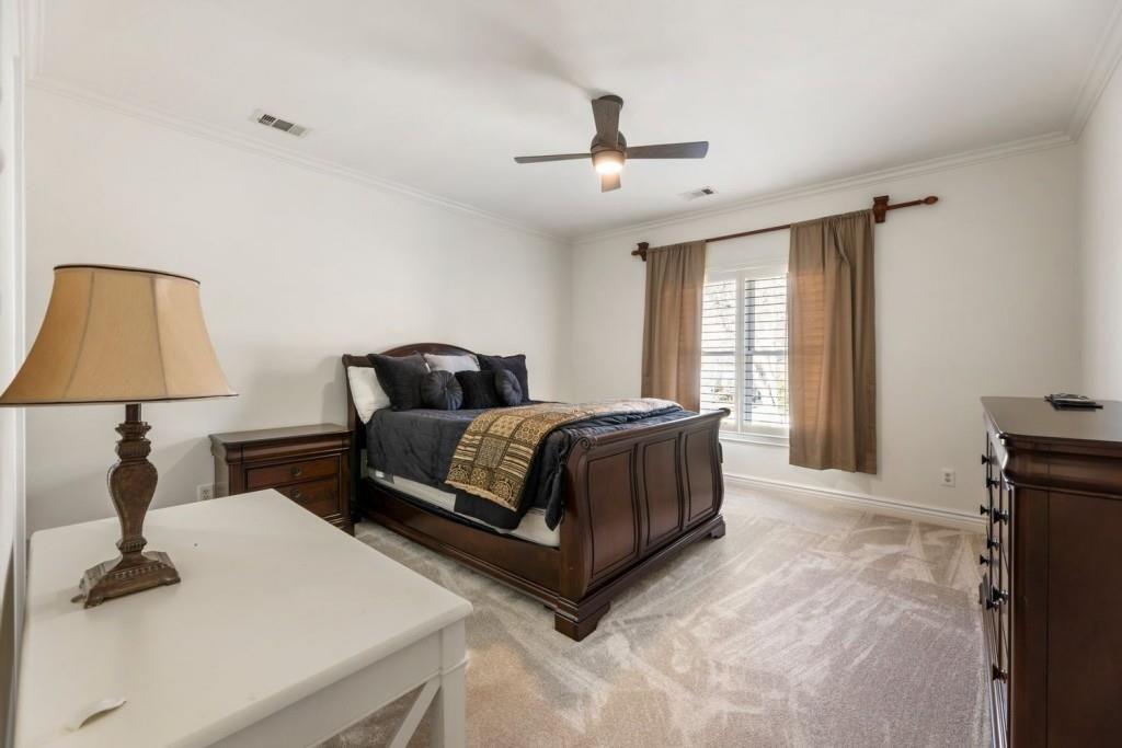 2250 Blackheath Trace Alpharetta, GA 30005 - Photo 31 of 51 a bedroom with a bed and a lamp