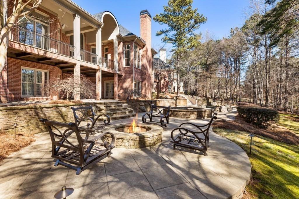 2250 Blackheath Trace Alpharetta, GA 30005 - Photo 46 of 51 a view of a patio with table and chairs and potted plants