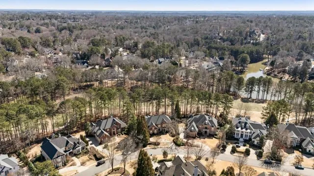 an aerial view of a city and mountains
