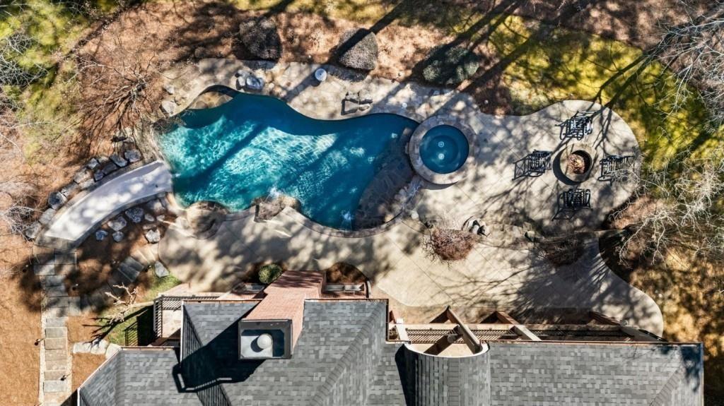 2250 Blackheath Trace Alpharetta, GA 30005 - Photo 5 of 51 an aerial view of a house with a yard and large trees
