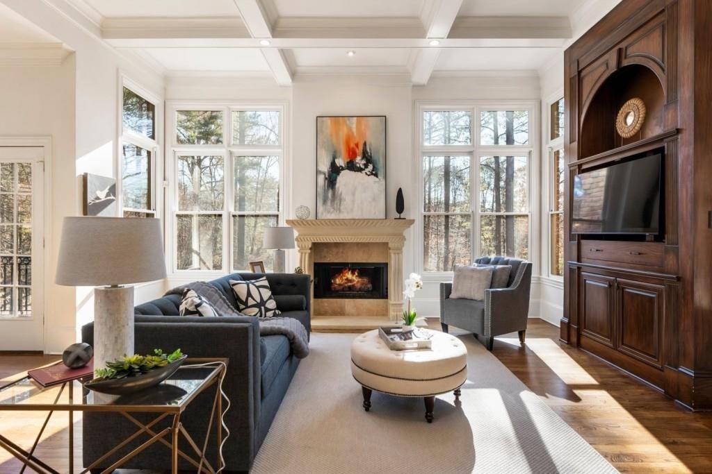 2250 Blackheath Trace Alpharetta, GA 30005 - Photo 7 of 51 a living room with furniture a window and a fireplace