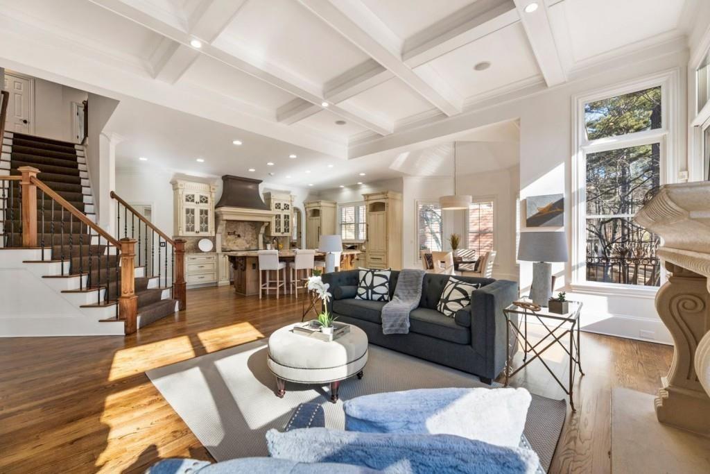 2250 Blackheath Trace Alpharetta, GA 30005 - Photo 9 of 51 a living room with furniture and a wooden floor