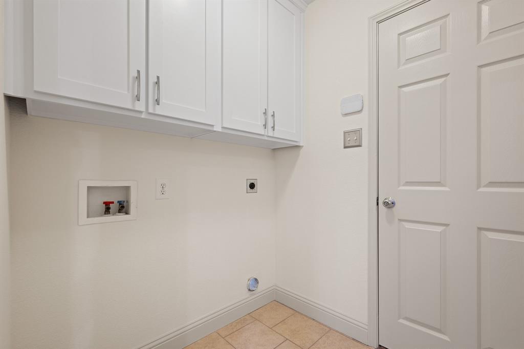 7103 Camp Creek Drive Arlington, TX 76002 - Photo 23 of 29 a view of cabinets