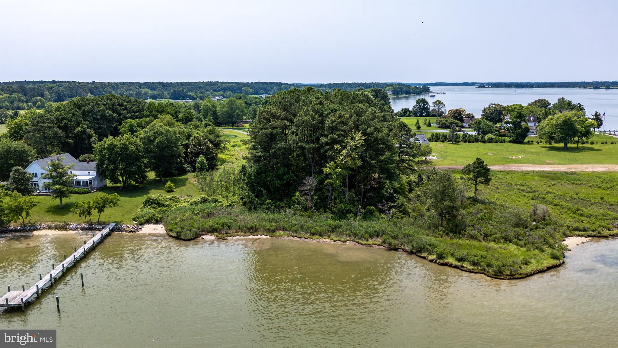 Enniskillen Road Easton, MD 21601 - Photo 11 of 14 a view of a lake with a building in the background