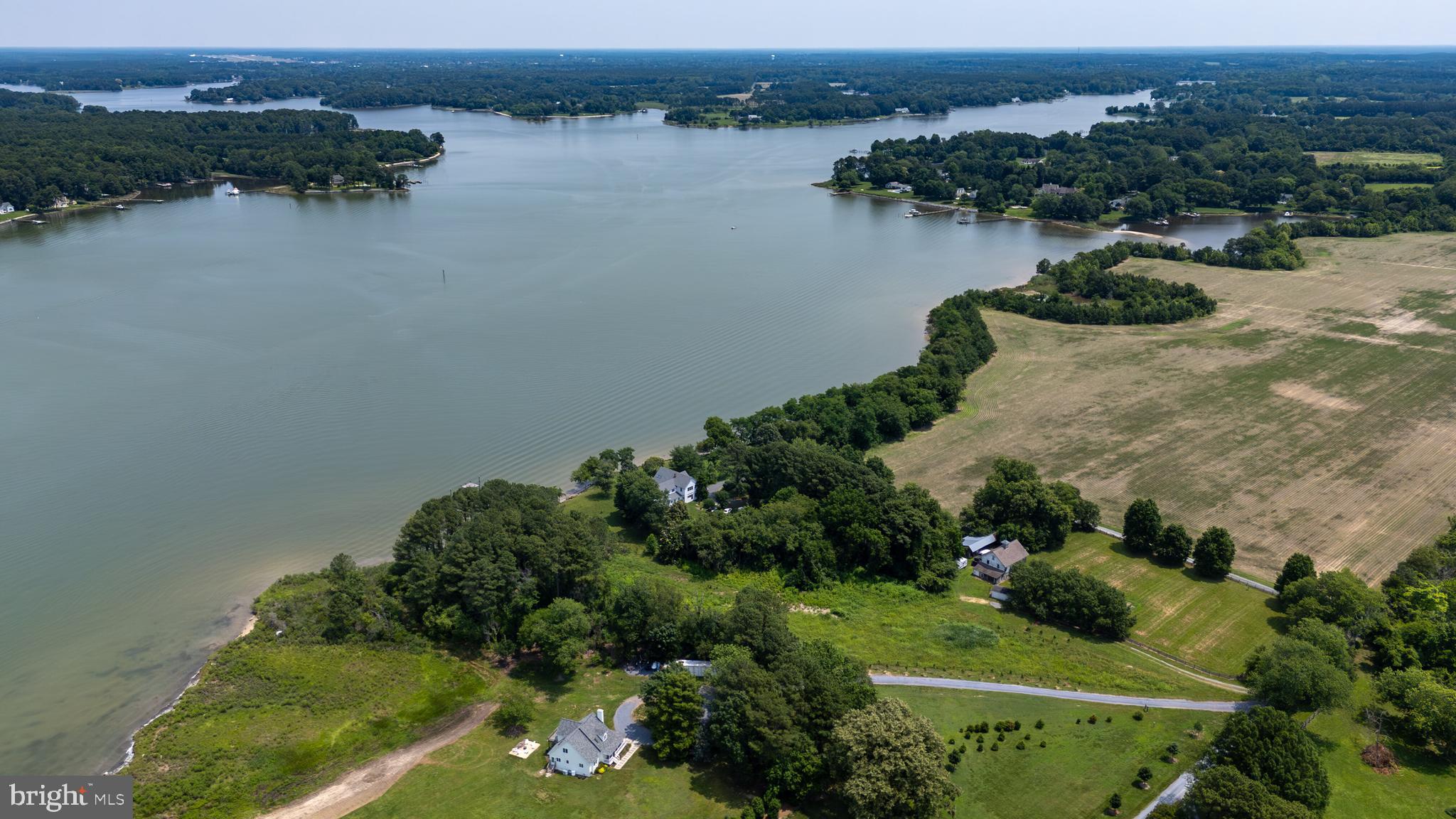 Enniskillen Road Easton, MD 21601 - Photo 8 of 14 an aerial view of lake and residential houses with outdoor space and seating