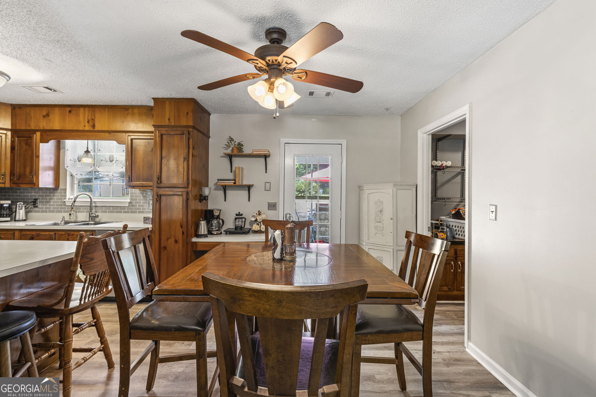 305 North Lake Drive Perry, GA 31069 - Photo 15 of 32 a view of a dining room with furniture window and outside view