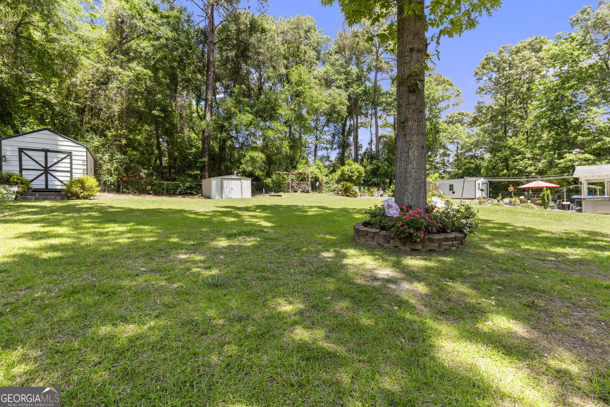 305 North Lake Drive Perry, GA 31069 - Photo 31 of 32 a view of a trees in a yard