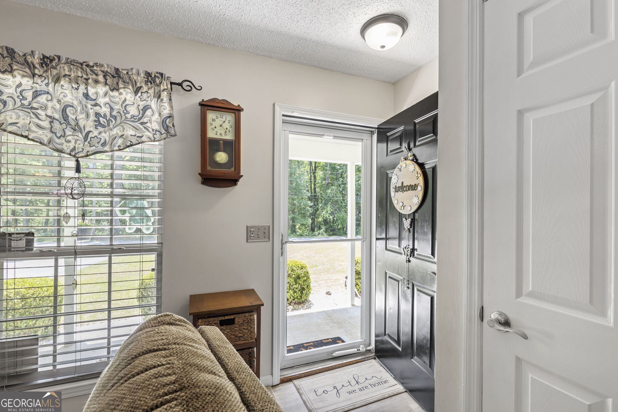 305 North Lake Drive Perry, GA 31069 - Photo 6 of 32 a bedroom with furniture and a window