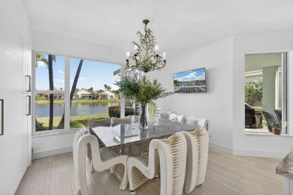 a bedroom with bed and wooden floor