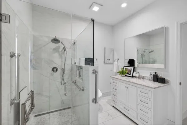 a bathroom with a shower and a toilet