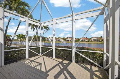 a view of a balcony with wooden floor