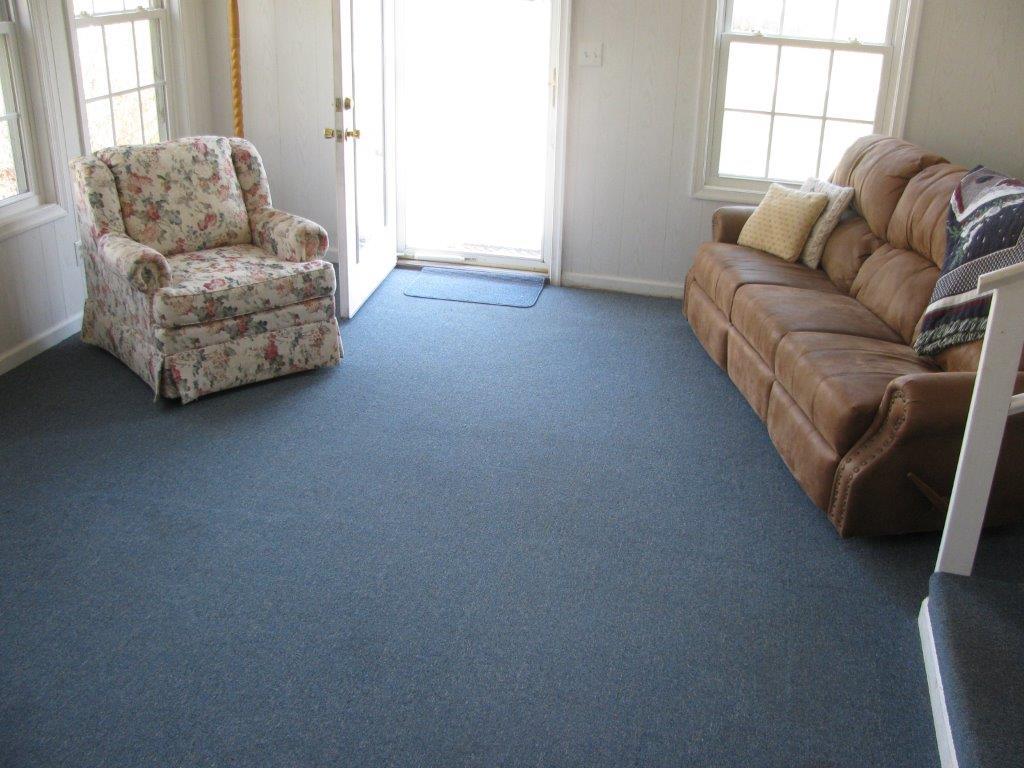 120 Saunders Shop Road Gretna, VA 24557 - Photo 11 of 32 a living room with furniture and a window