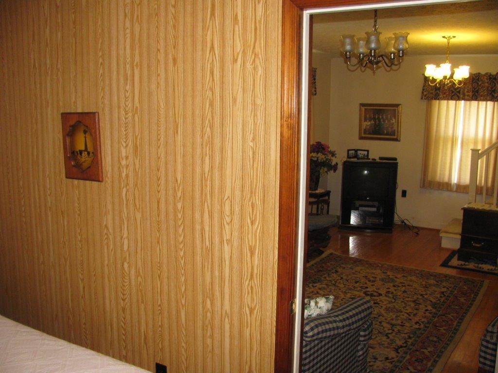 120 Saunders Shop Road Gretna, VA 24557 - Photo 23 of 32 a en suite bathroom with a granite countertop sink and a mirror