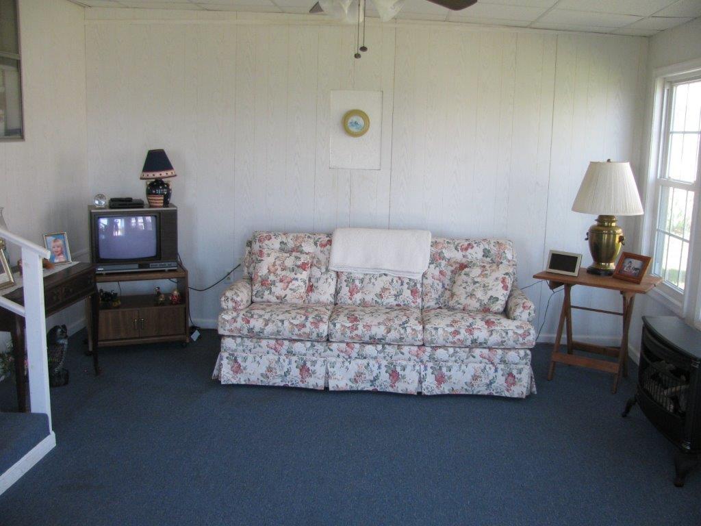120 Saunders Shop Road Gretna, VA 24557 - Photo 10 of 32 a bedroom with furniture and a bed