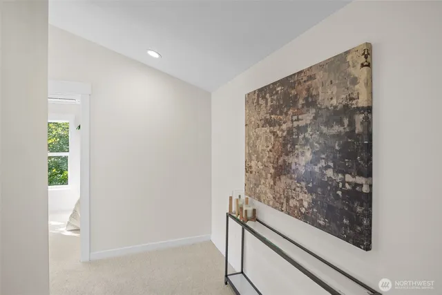 a bedroom with a bed and a chair