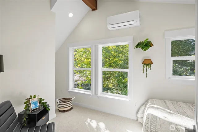 a bathroom with a shower sink and mirror