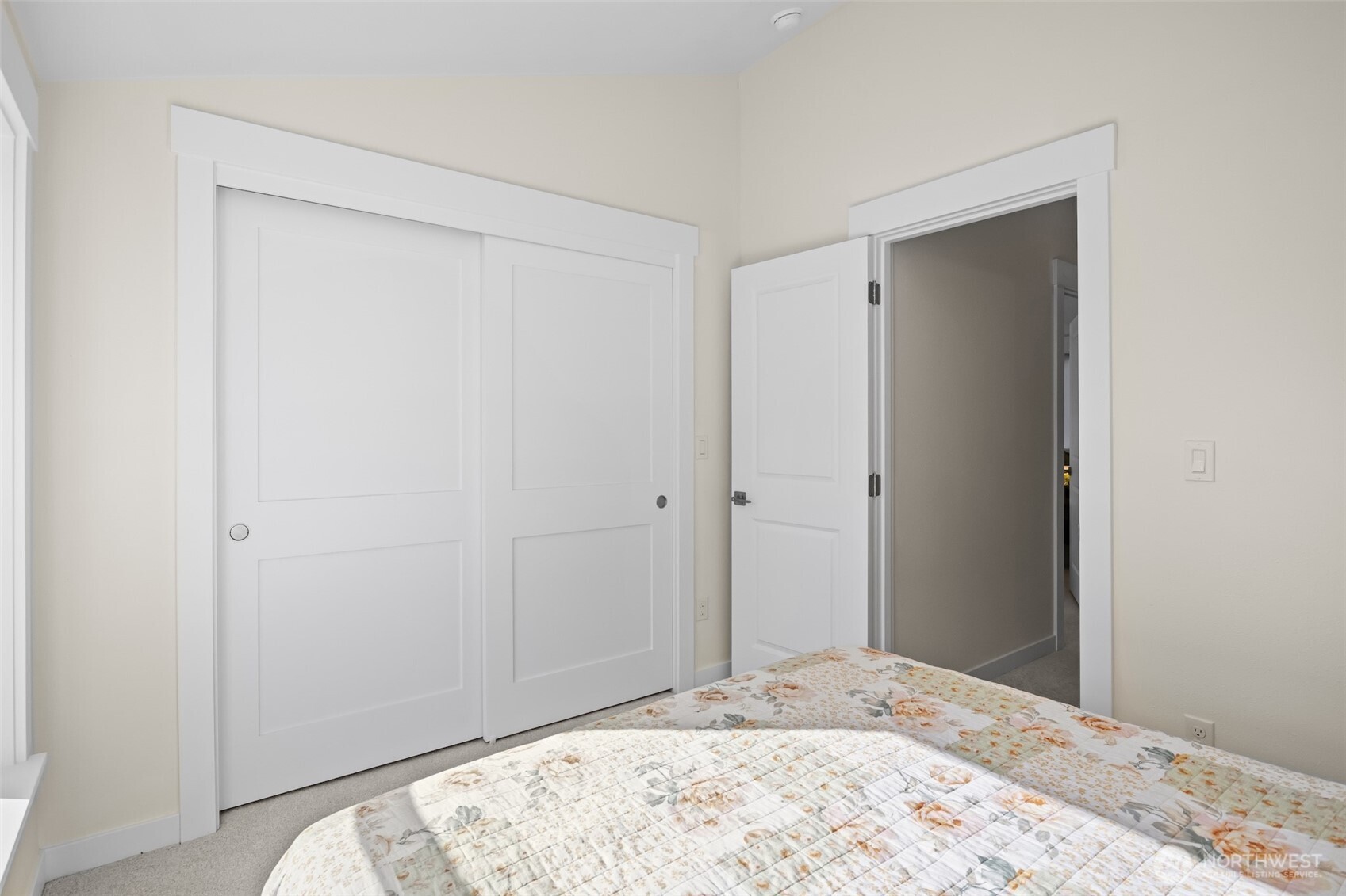 9545 Wallingford Avenue North Seattle, WA 98103 - Photo 21 of 22 a view of a bedroom in a house