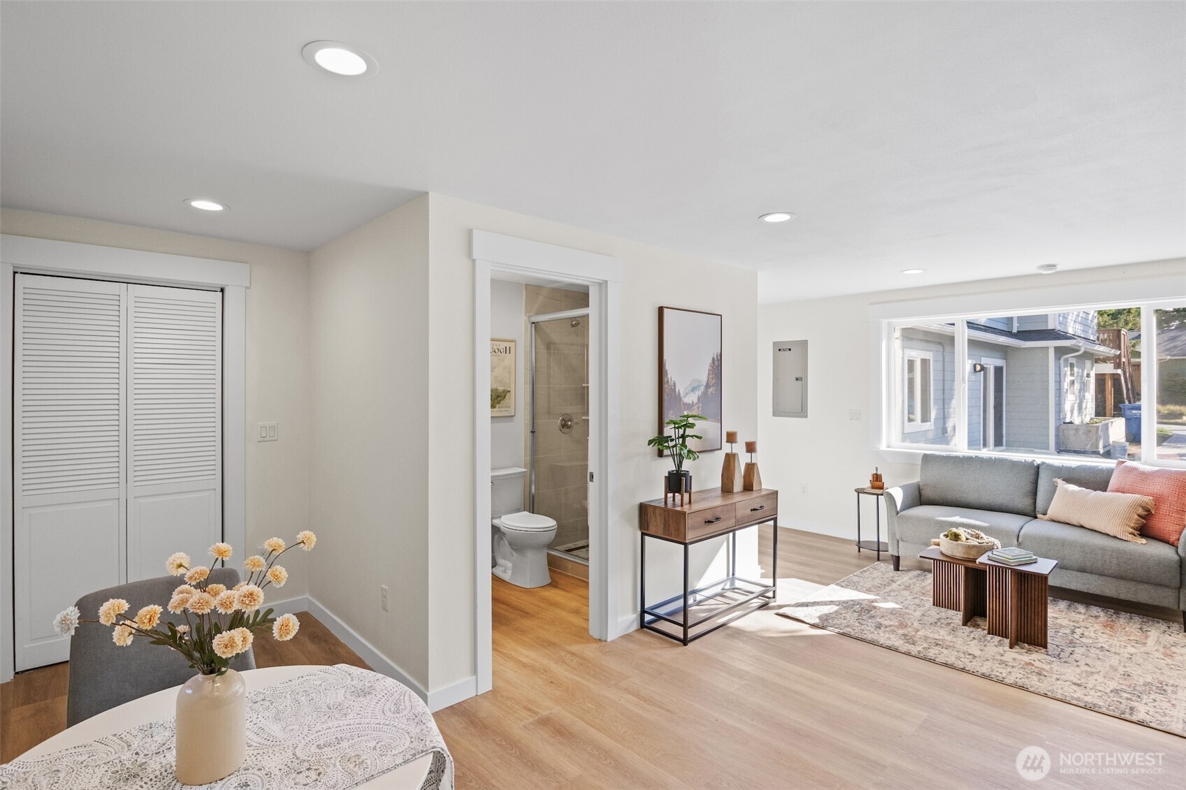 9545 Wallingford Avenue North Seattle, WA 98103 - Photo 10 of 22 a living room with furniture and wooden floor