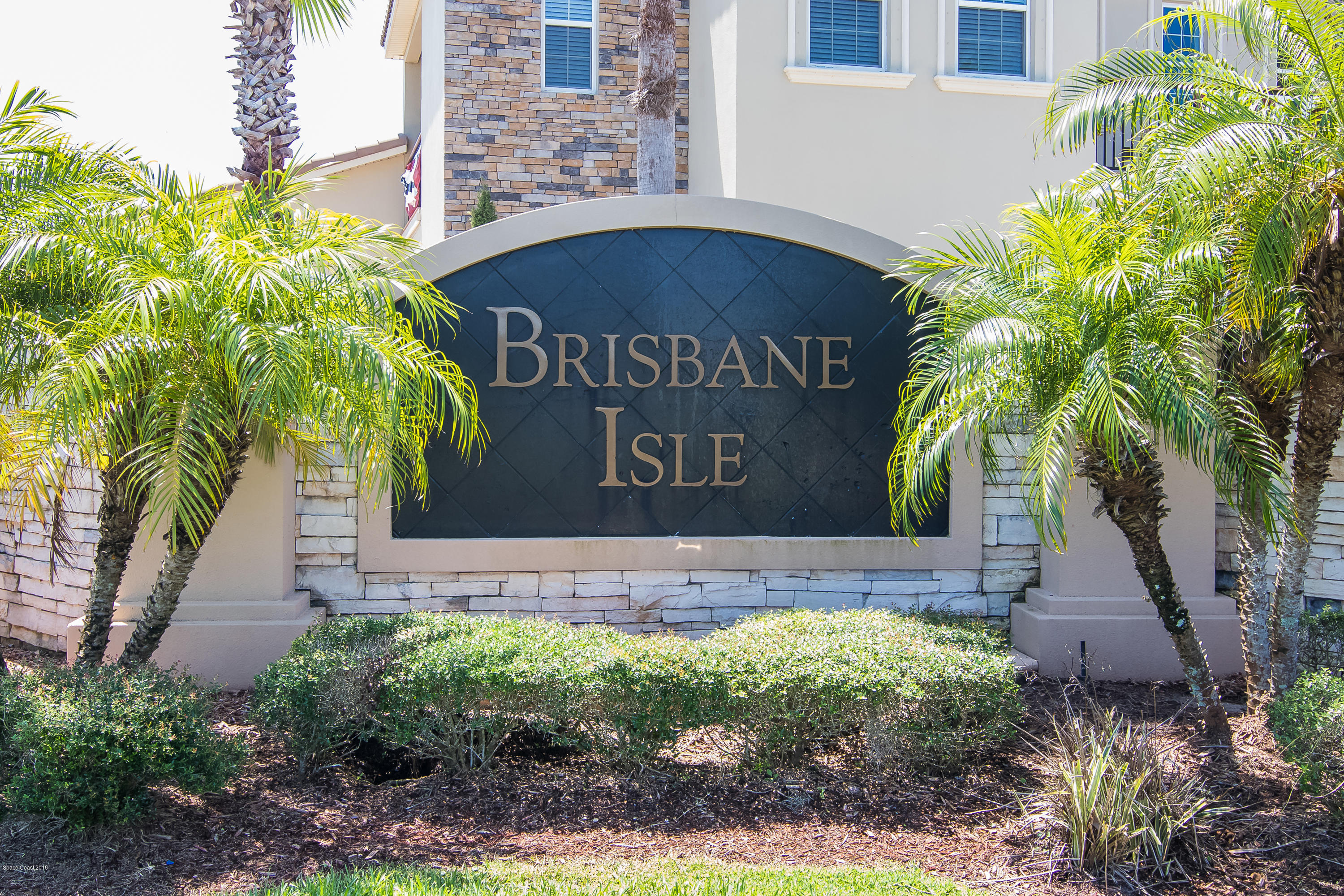 4025 Waterloo Place Melbourne, FL 32940 - Photo 2 of 29 a view of a sign board with a small yard