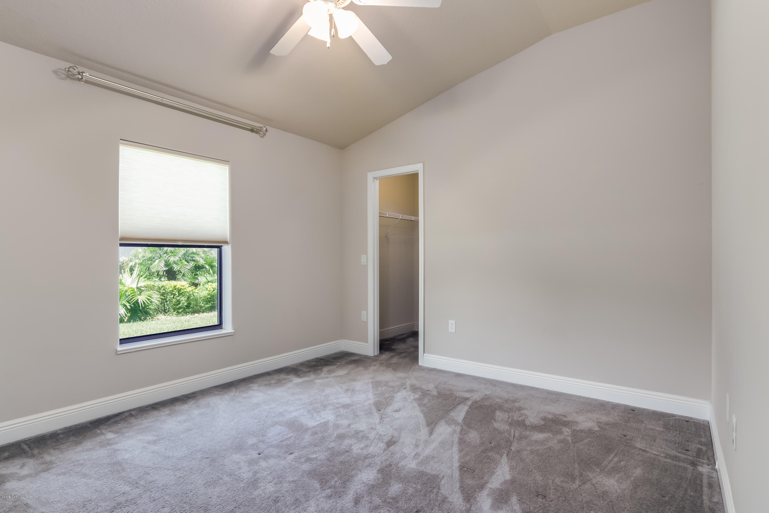 4025 Waterloo Place Melbourne, FL 32940 - Photo 19 of 29 an empty room with windows
