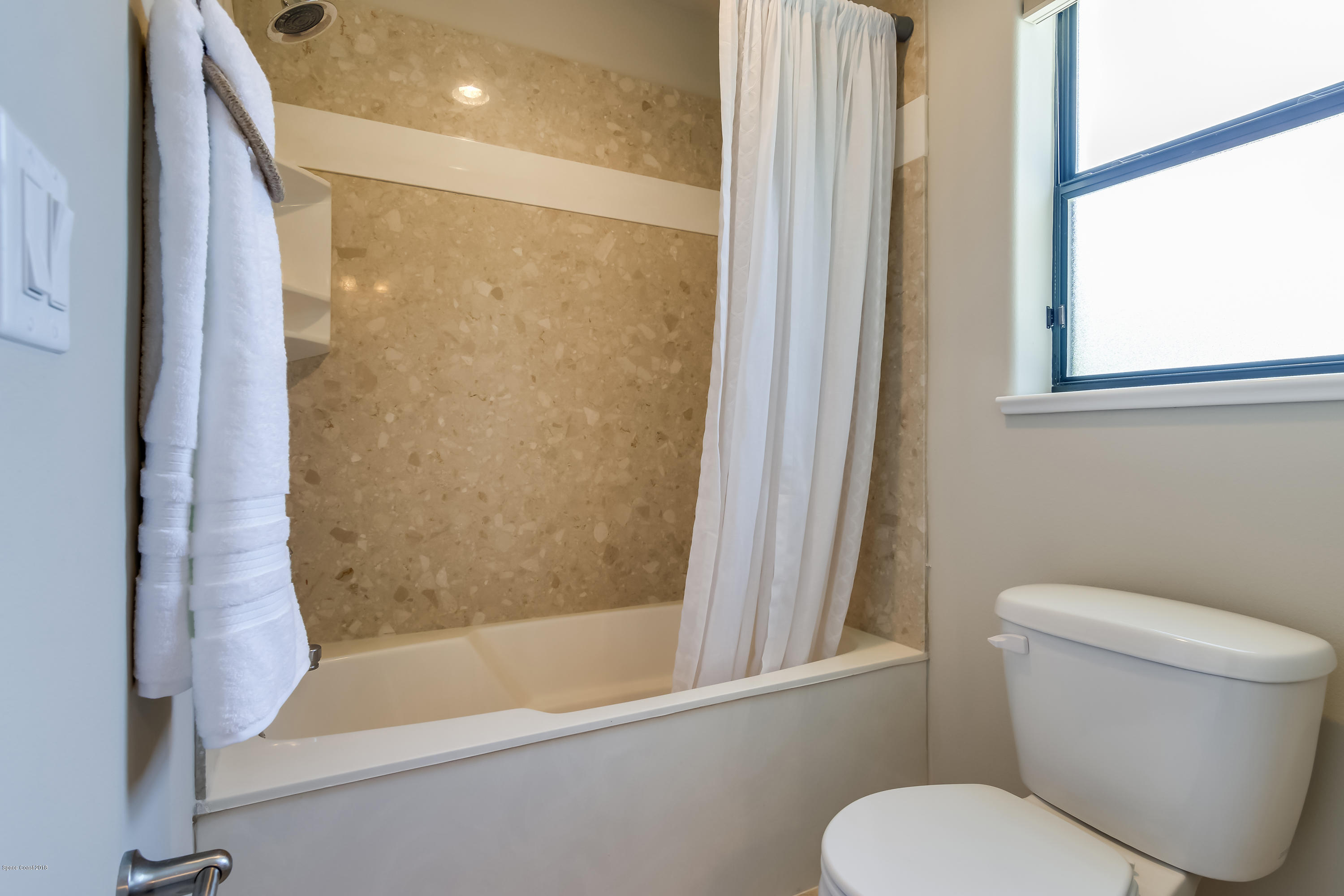 4025 Waterloo Place Melbourne, FL 32940 - Photo 20 of 29 a bathroom with a toilet and a bathtub