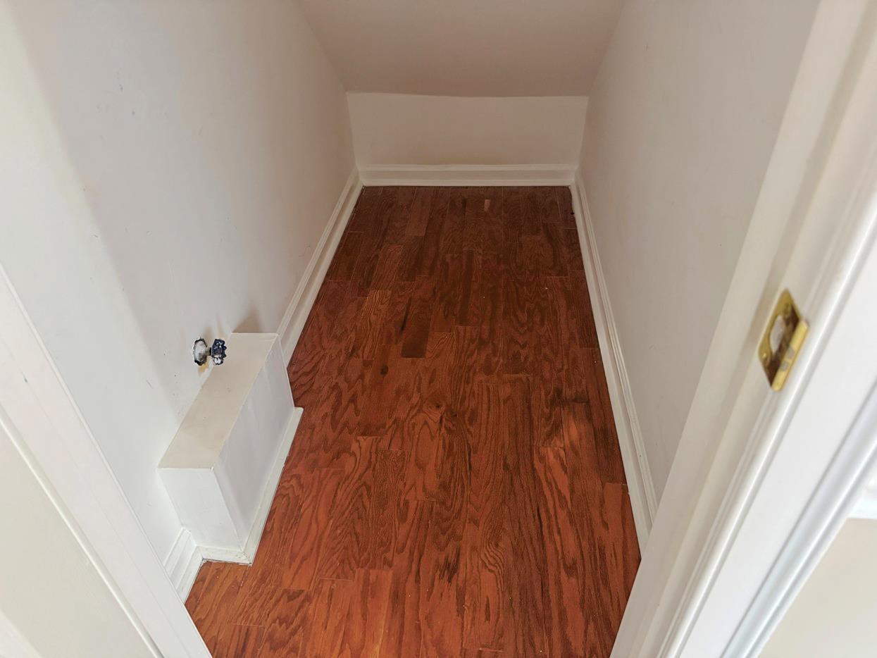 8810 Raspberry Lane Memphis, TN 38016 - Photo 15 of 28 Room details featuring baseboards and wood finished floors