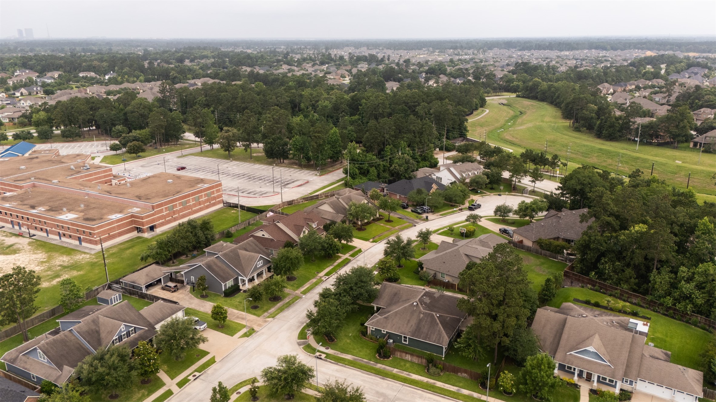 31032 Sunfall Trail Lane Spring, TX 77386 - Photo 36 of 39 an aerial view of residential houses with outdoor space