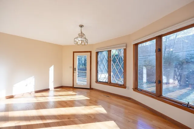 a view of a room with a large window