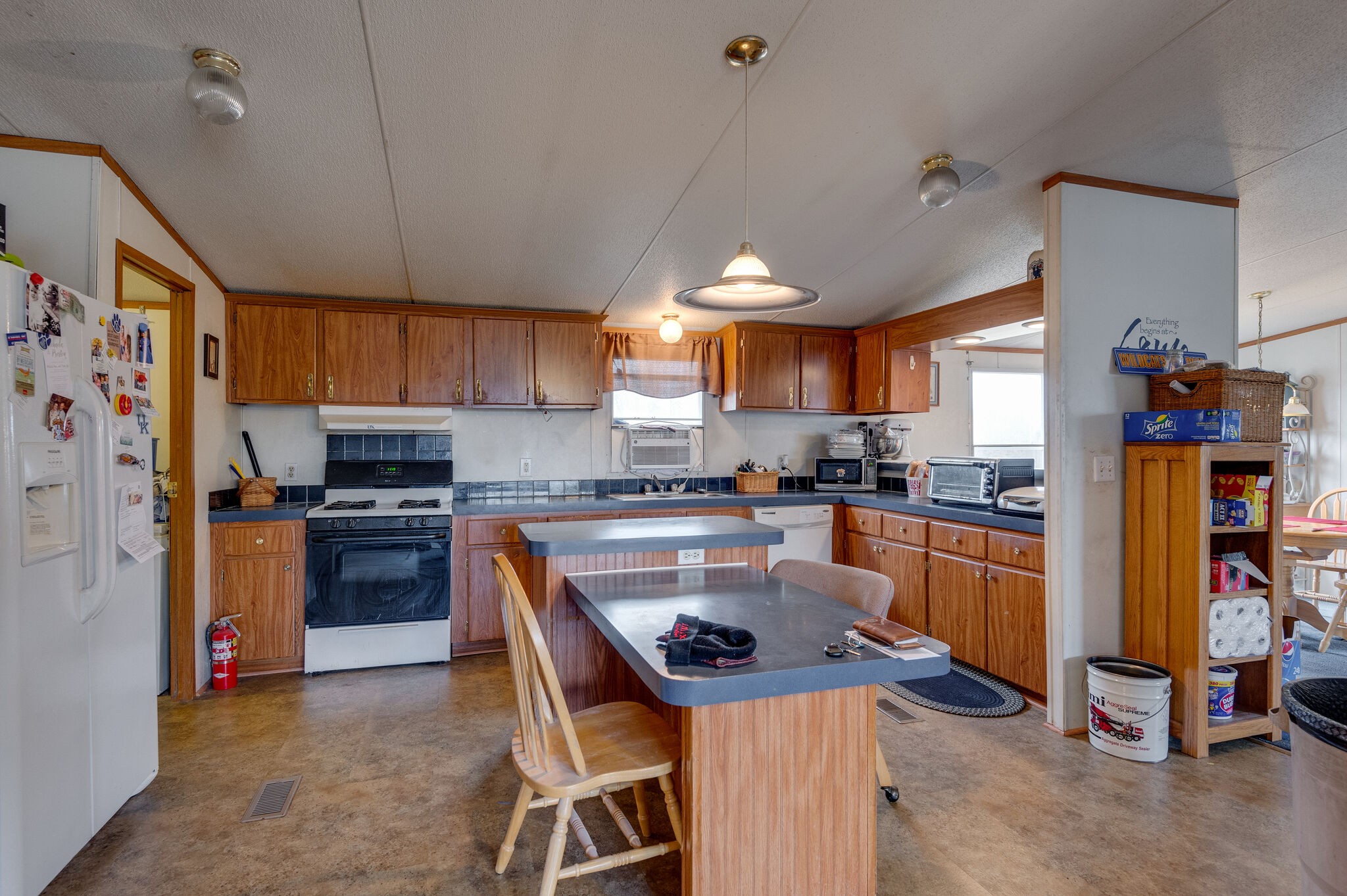 2848 Jack Teasley Road Pleasant View, TN 37146 - Photo 28 of 45 a kitchen with granite countertop lots of counter top space and appliances