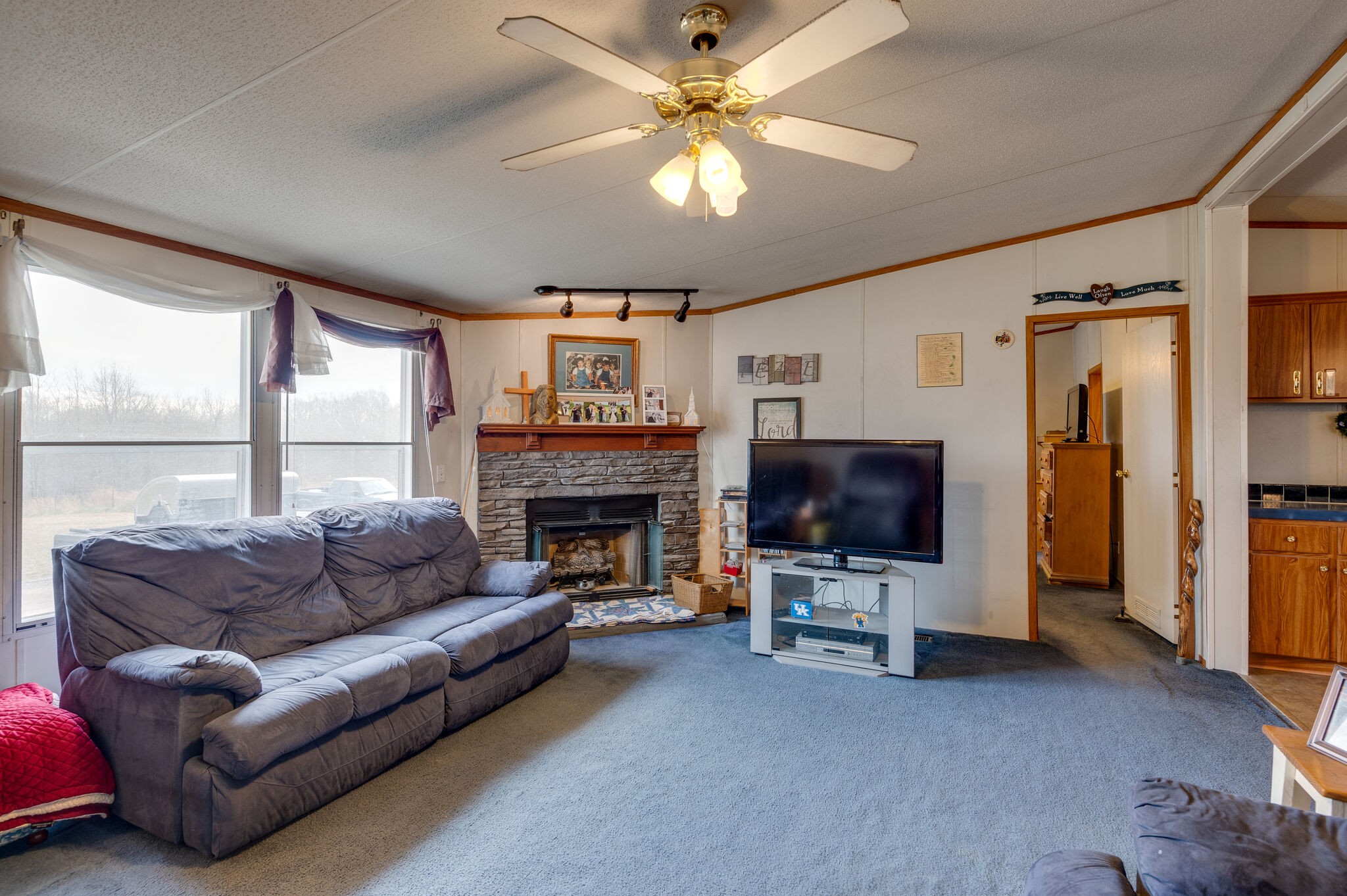 2848 Jack Teasley Road Pleasant View, TN 37146 - Photo 33 of 45 a living room with furniture and a flat screen tv