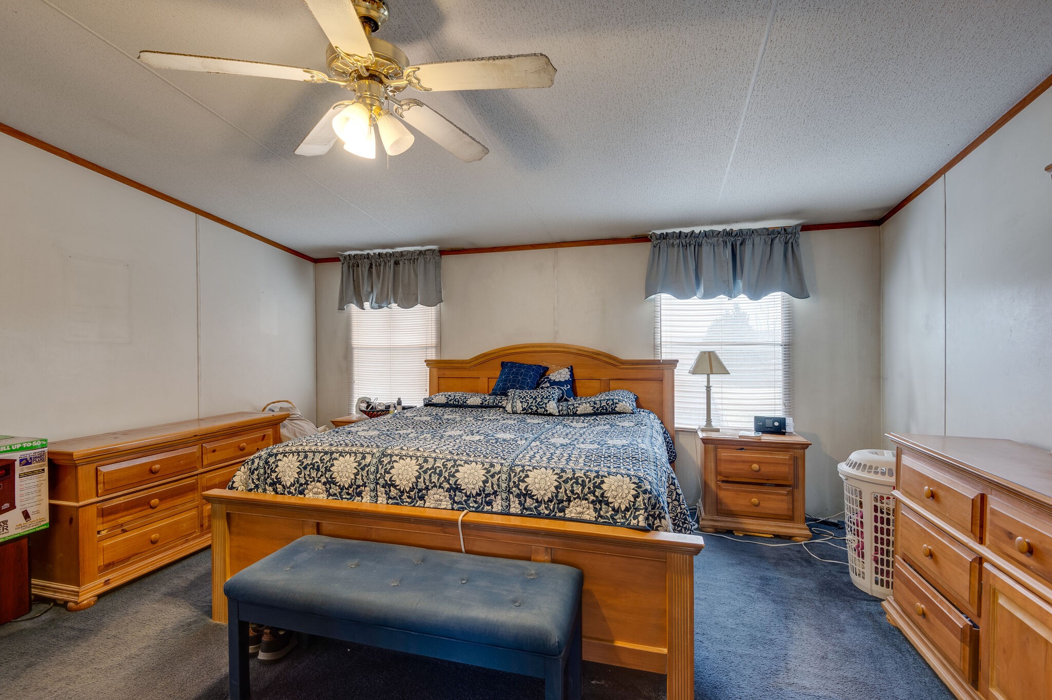 2848 Jack Teasley Road Pleasant View, TN 37146 - Photo 35 of 45 a bedroom with a bed and a chandelier