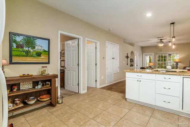 a spacious bathroom with a double vanity sink and a mirror