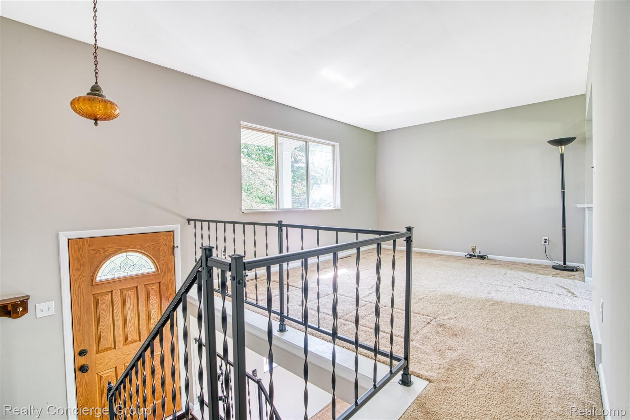 6505 Byron Road Howell, MI 48855 - Photo 5 of 20 Open entryway welcomes you inside this beautiful split-level.