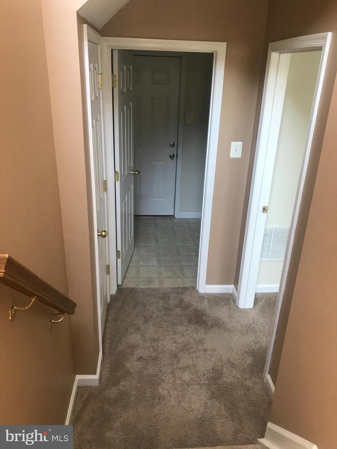 870 Lowe Road Baltimore, MD 21220 - Photo 22 of 26 Lower level Foyer & entrance to bedroom