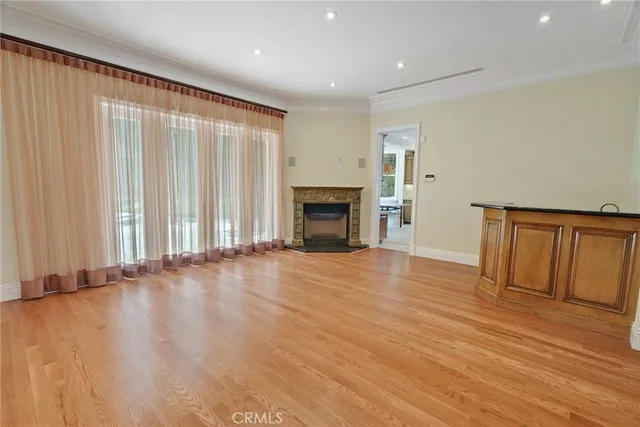 a kitchen with a stove sink and cabinets