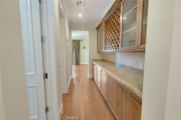 a utility room with sink dryer and washer