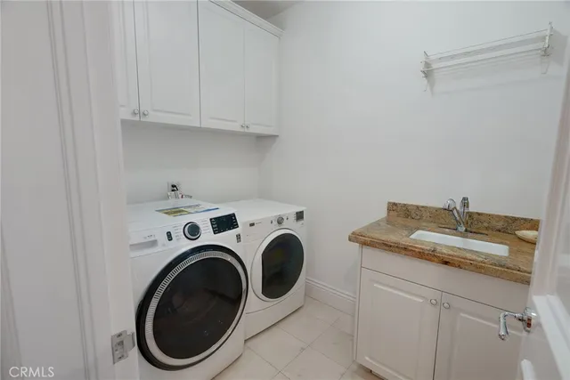 an empty room with wooden floor and a window