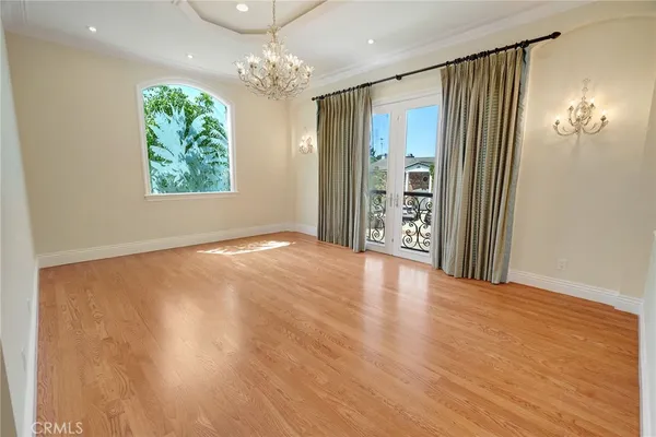 a view of livingroom with kitchen and window