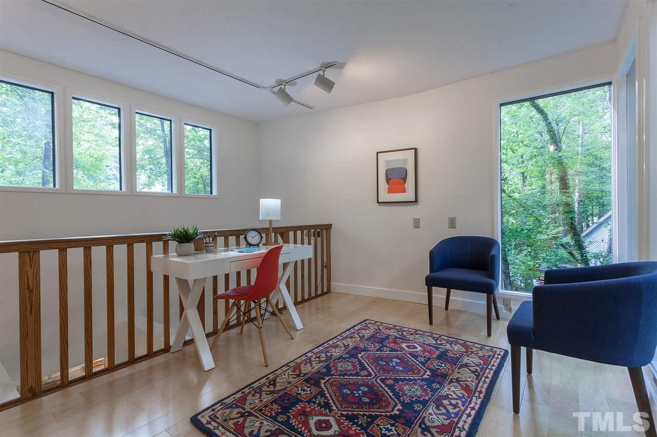 3903 Darby Road Durham, NC 27707 - Photo 14 of 30 This home features two spaces perfect for working from home.