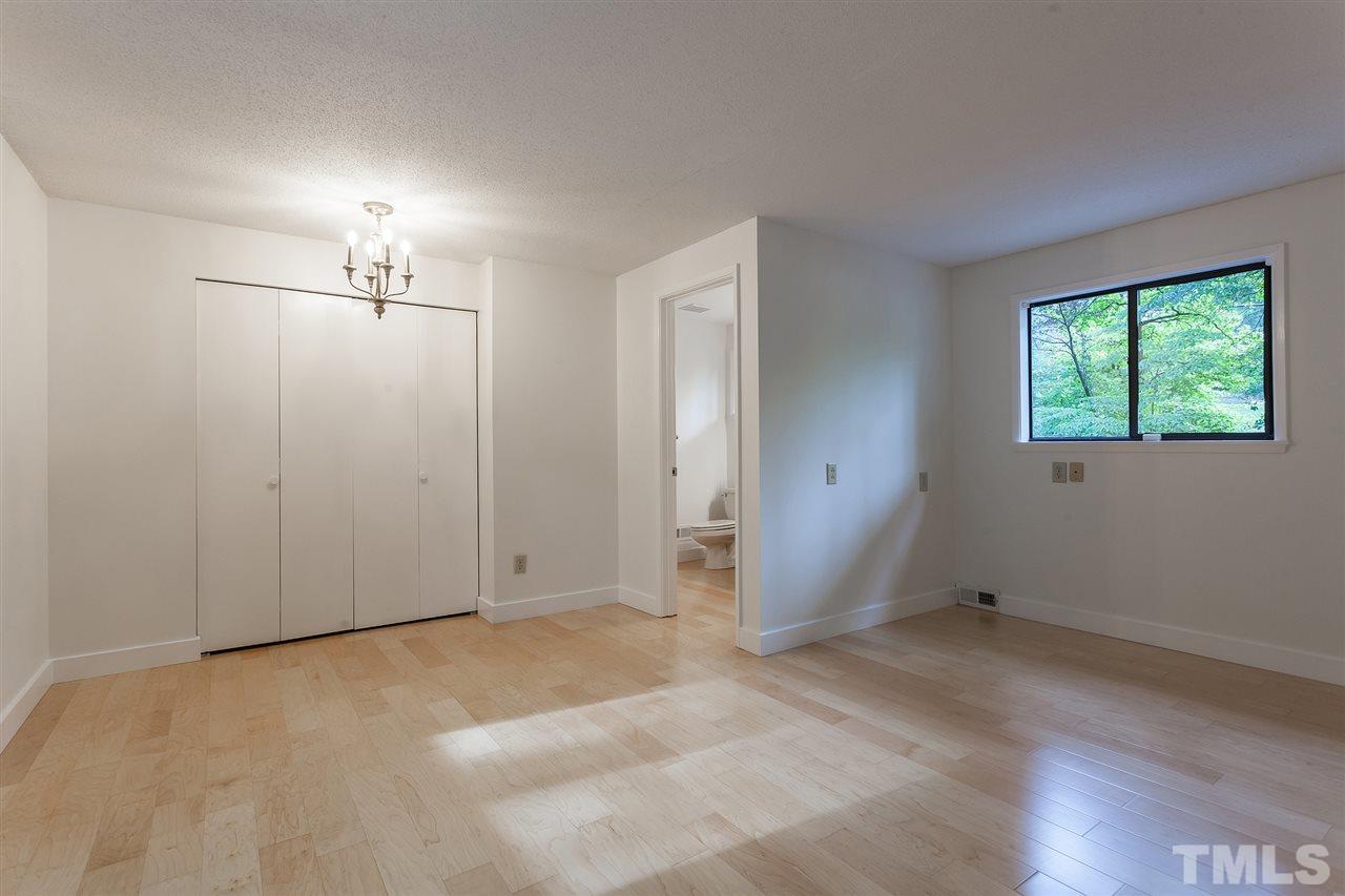 3903 Darby Road Durham, NC 27707 - Photo 15 of 30 Located on the upper floor adjacent to the loft office space; this room has it's own full bathroom. Perfect for guests.