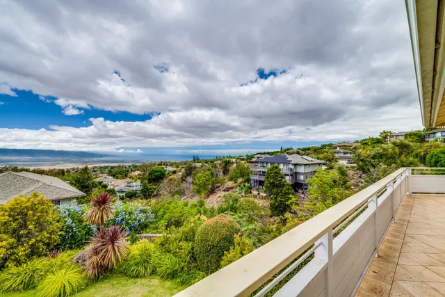 a view of a swimming pool from a balcony