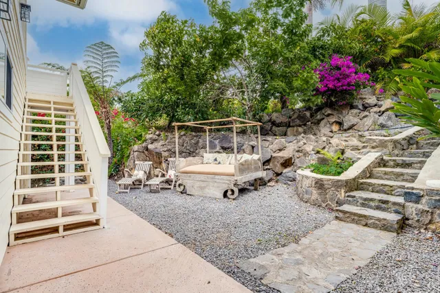 a house view with a garden space