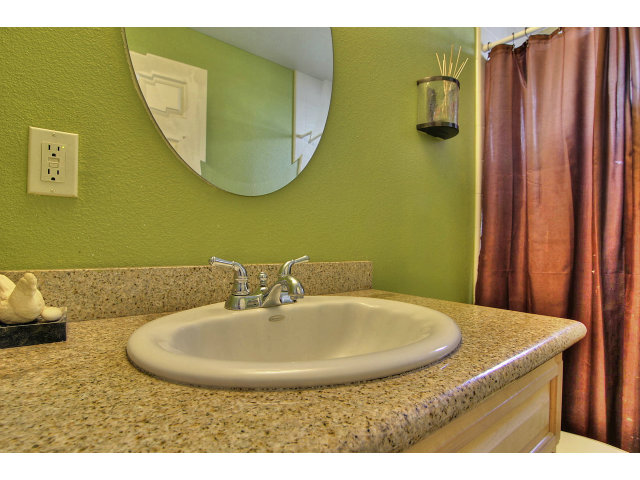 1289 Trinity Avenue Seaside, CA 93955 - Photo 11 of 13 a bathroom with a sink and mirror