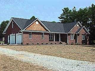 5 Fork Junction Road Timberlake, NC 27583 - Photo 1 of 1 a front view of a house with a yard