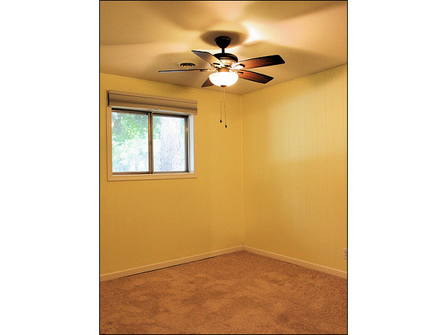 556 White Oak Road Bolingbrook, IL 60440 - Photo 22 of 25 a view of a room with a ceiling fan