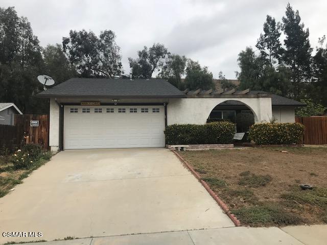 6405 Keystone Street Simi Valley, CA 93063 - Photo 1 of 17 a front view of a house with garden