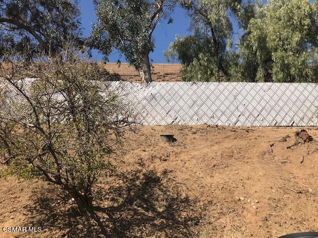 6405 Keystone Street Simi Valley, CA 93063 - Photo 15 of 17 a view of a yard covered with snow