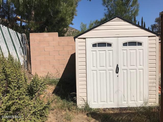 6405 Keystone Street Simi Valley, CA 93063 - Photo 16 of 17 a view of a house with backyard